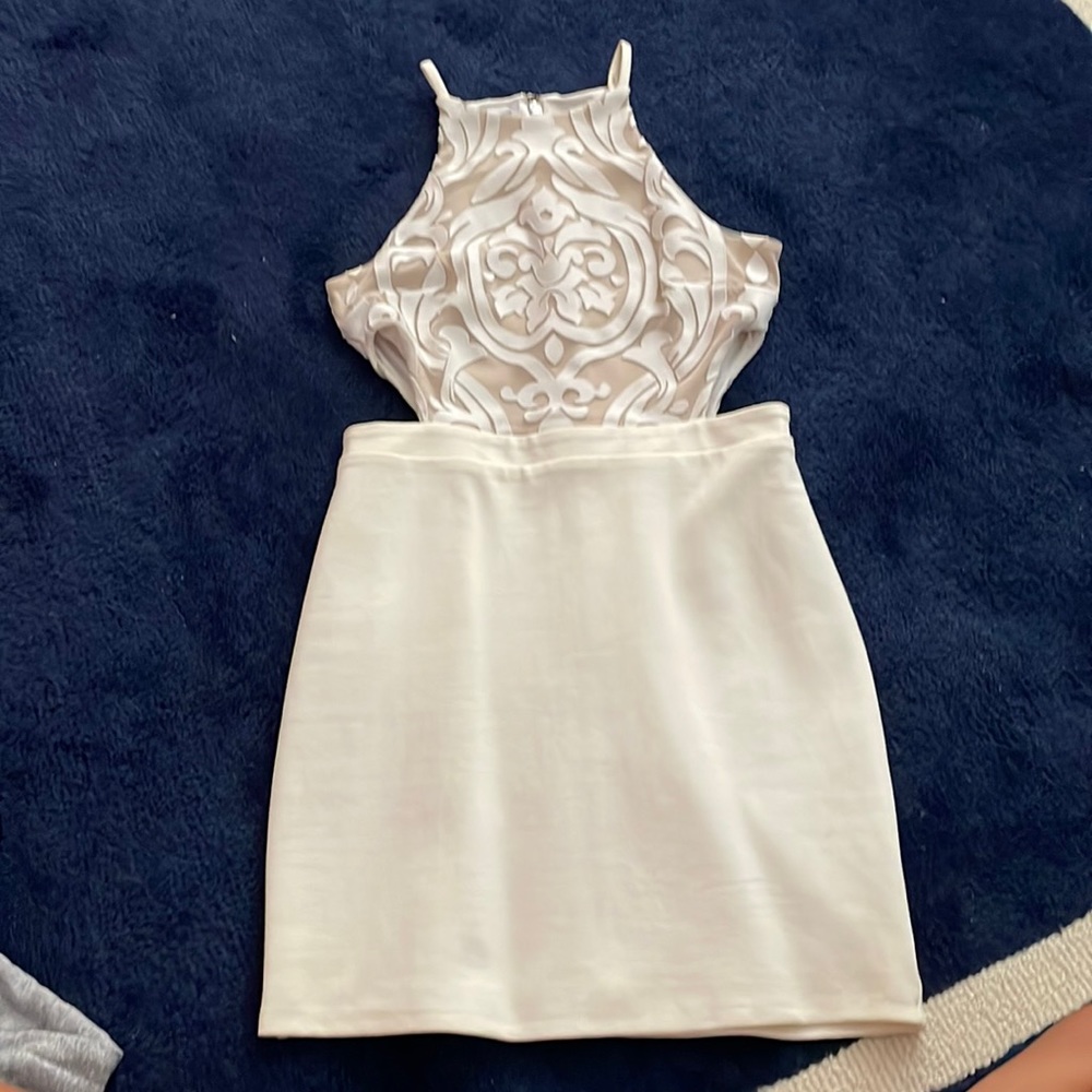 White mini dress with detailing on top